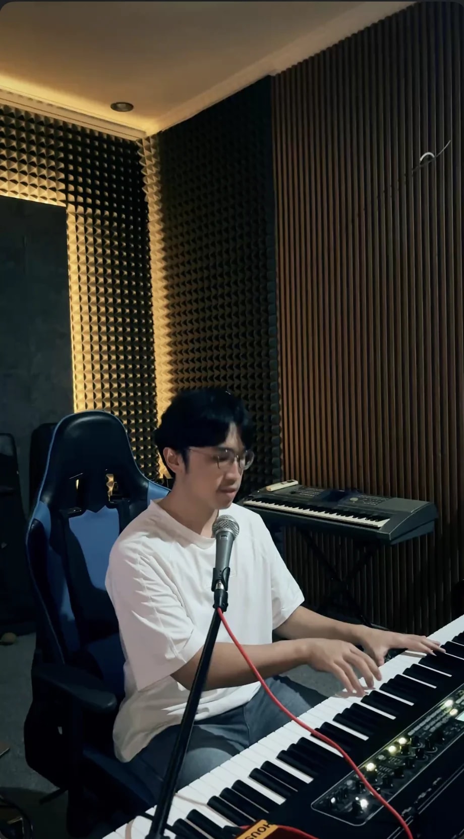 Keane playing piano in the studio